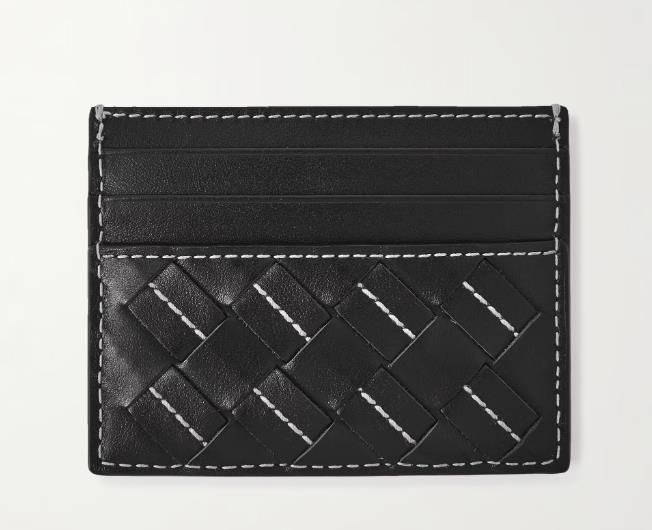 Image of a stylish Onbottega card holder in black leather with embossed logo