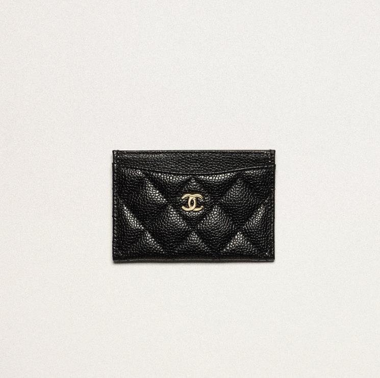 Chanel card holder in black leather with gold logo detailing