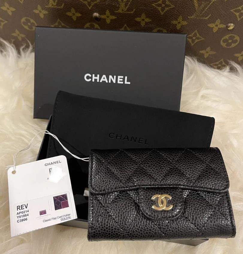 Chanel flap card holder in black leather with gold hardware