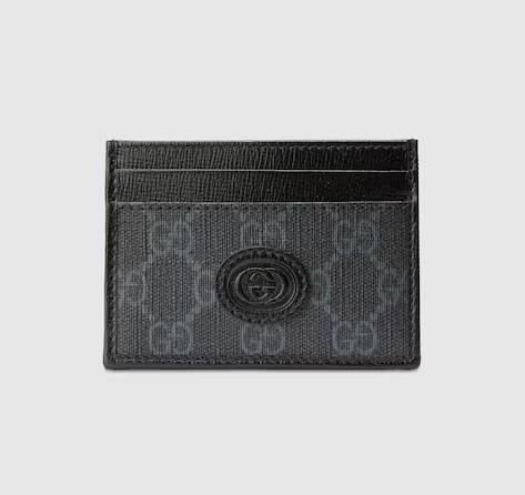 Gucci card holder in brown leather with embossed logo design