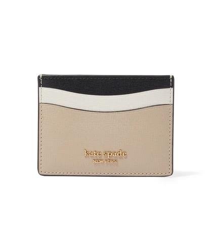 Kate Spade card holder in black leather with gold logo detailing