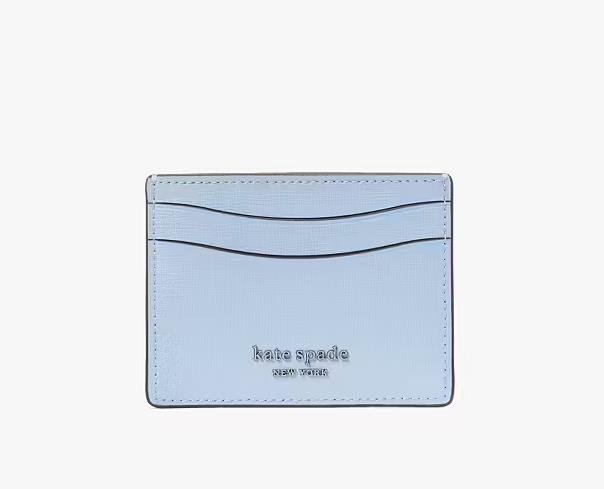 Stylish card holder by Kate Spade with chic design and signature logo embossing