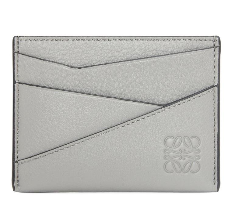 Stylish Loewe card holder in sleek white leather with modern detailing