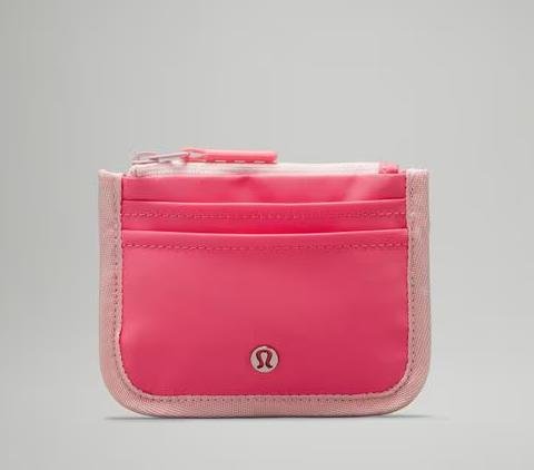 Black leather card holder with embossed Lululemon logo