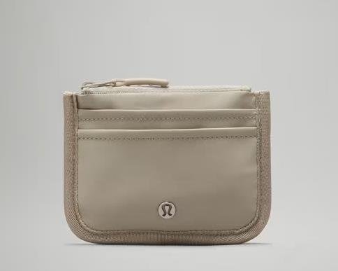 Lululemon card holder in sleek design with brand logo embossed