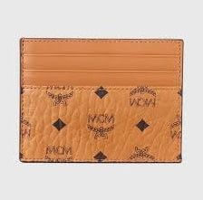 Black leather MCM card holder with gold logo detailing