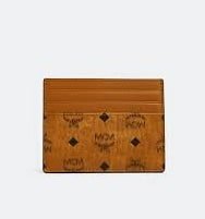 Luxury MCM card holder in brown leather with embossed logo design