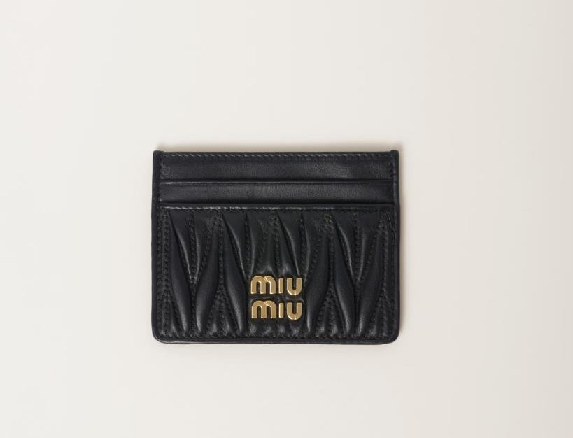 Black leather Miu Miu card holder with gold logo embellishment